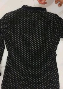 Elegant Black Blazer with Unique Pattern