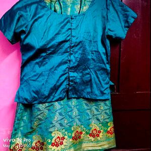 Teal Silk Blouse And Long Skirt( Pattupavada)