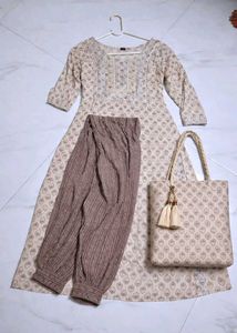 Elegant Kurta Set with Tassel Bag