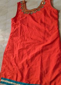 Vibrant Orange Kurta with Embellished Neckline
