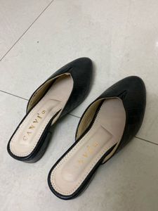 Black Mules Flats