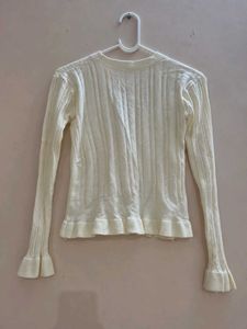 Cream Ribbed Cardigan with Ruffle Hem