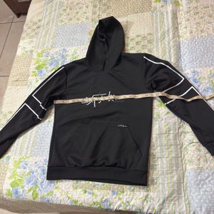 Stylish Black Hoodie with White Accents