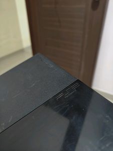 PS2 Console With 11 CD's (Non Working)