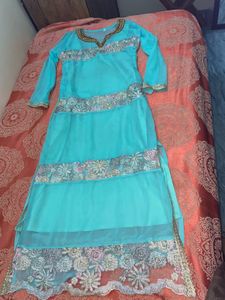 Elegant Teal Kurta Set with Intricate Embroidery