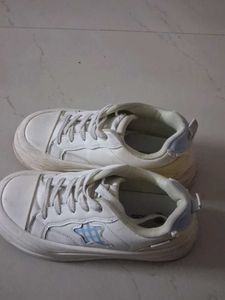 White Casual Sneakers with Blue Accents