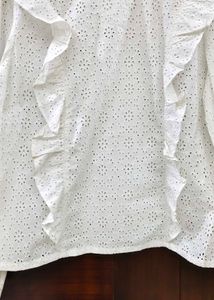 White eyelet ruffle long sleeve top