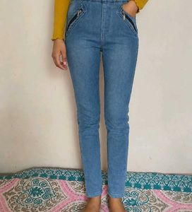 Light Blue Denim Jeans with Zipper Pockets