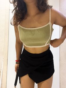 Stylish Black Skort with green sleeveless top