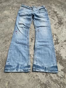 Distressed Light Wash Flare Jeans