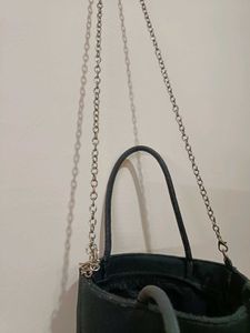 Rhinestone studded smiley face crossbody bag