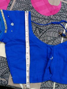 Royal Blue Colour Blouse Dry Cleaned No Flaws Have Margin Of 1.5 Inches.