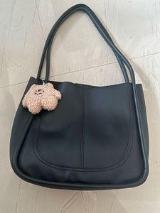 Chic Black Tote Bag with Cute Charm