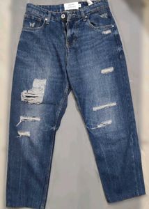 Distressed Blue Denim Jeans