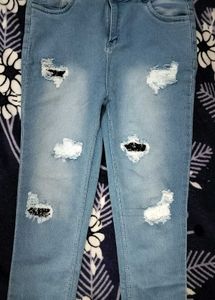 Ripped Light Wash Denim Jeans