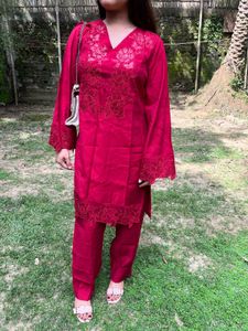 Beautiful Red Coords Set with price tag.