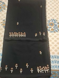 Elegant Black Embroidered georgette Saree attached
