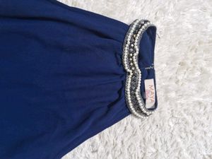 blue tops with stones.