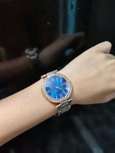 Elegant Blue Dial Watch with Crystal Accents