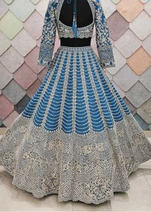 Exquisite Teal Embellished Lehenga Choli
