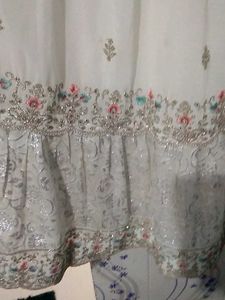 Farashi sharara and peplum top fully embroidered.