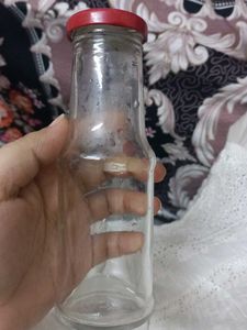 Glass Bottle with Red Lid