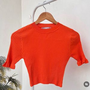 Orange Ribbed Cropped Top