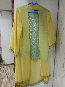 Mint Green Sequin Top and yellow jacket