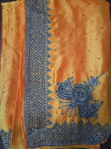 Exquisite Yellowish Embellished Saree