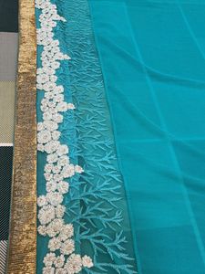 Beautiful Teal Blue Saree with Gold Border