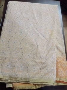 Elegant Cream Bandhani Saree