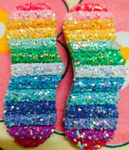 A Pair Of Glittery Rainbow Clips