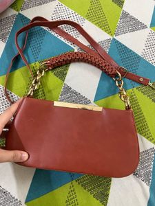 Stylish Brown Handbag with Gold Chain Strap