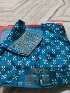 Beautiful Teal Saree with Intricate Gold Border