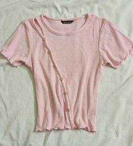 pink ribbed button-up crop top