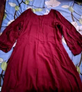 wine red/maroon frock with a slit bell sleeves