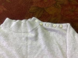 white button neckline sweater