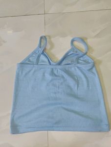 A Blue Crop Top With Crochet