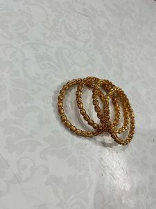Elegant Gold-Toned Stone Bangles
