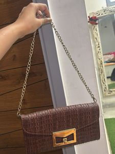 Elegant Brown Textured Clutch Bag