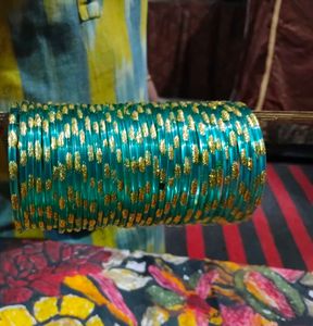 Elegant Green Glass Bangles with Gold Accents