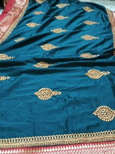 Elegant Teal Embroidered Saree
