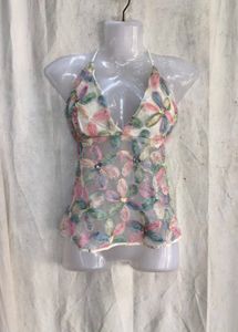 69. Sheer Floral Applique Halter Top