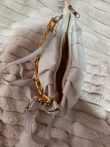 Chic White Handbag with Gold Chain