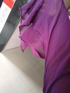 Elegant Purple Gown with Gold Embellishments