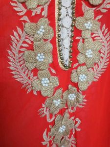 Elegant Red Kurta with Intricate Embellishments
