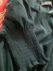 imported  top in dark green colour