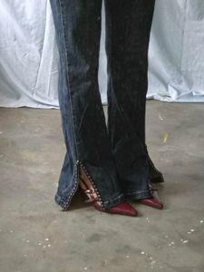 Flared Jeans with Studded Slits