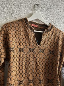 Beautiful Woolen Mustard Kurti With Stand Collar