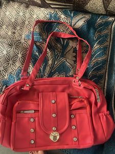 Chic Coral Handbag with Embellishments